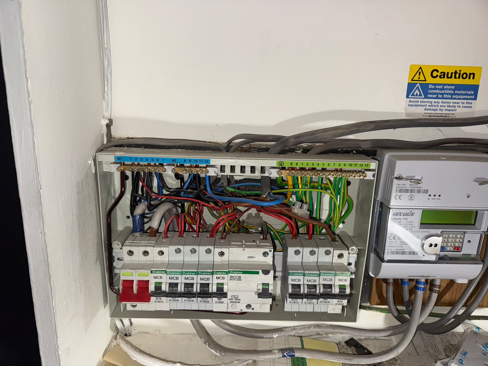 Wylex 18th Edition consumer unit with a full row of RCBOs installed by Electrust