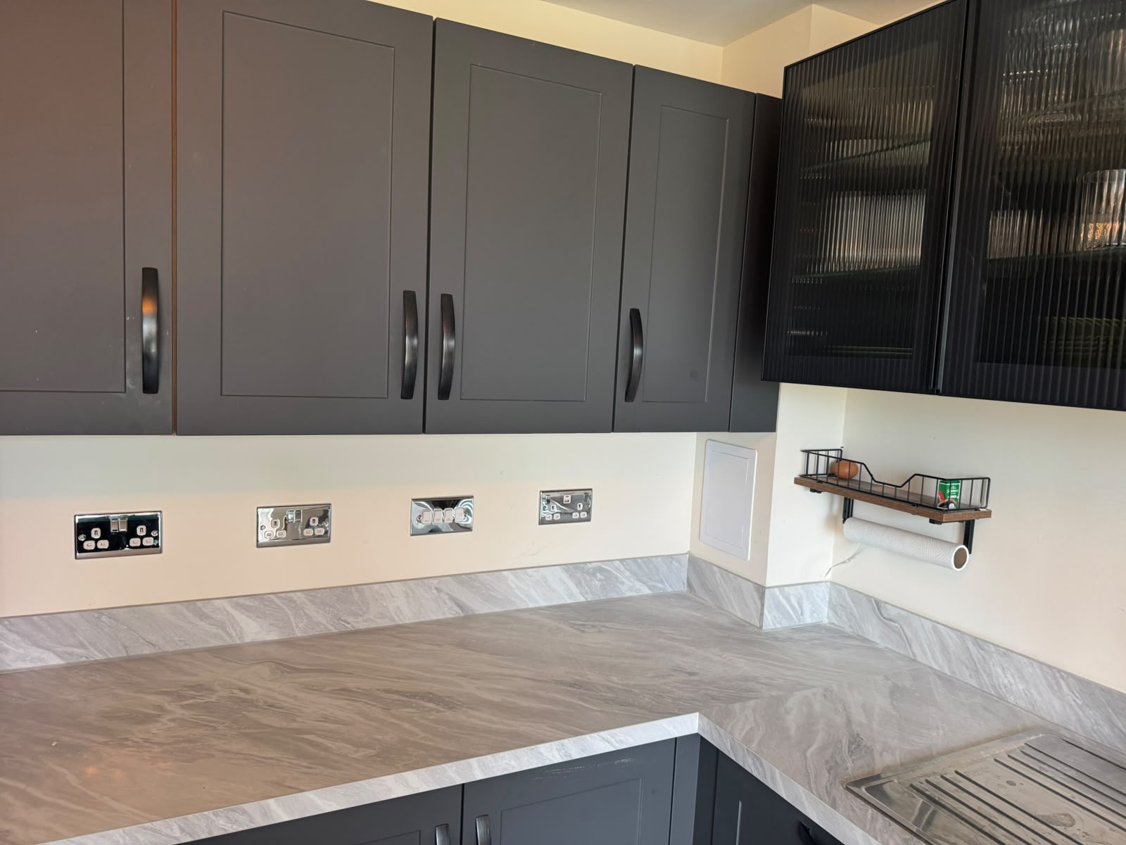 Kitchen and bathroom electrical installation by Electrust — sockets, downlights and extractors