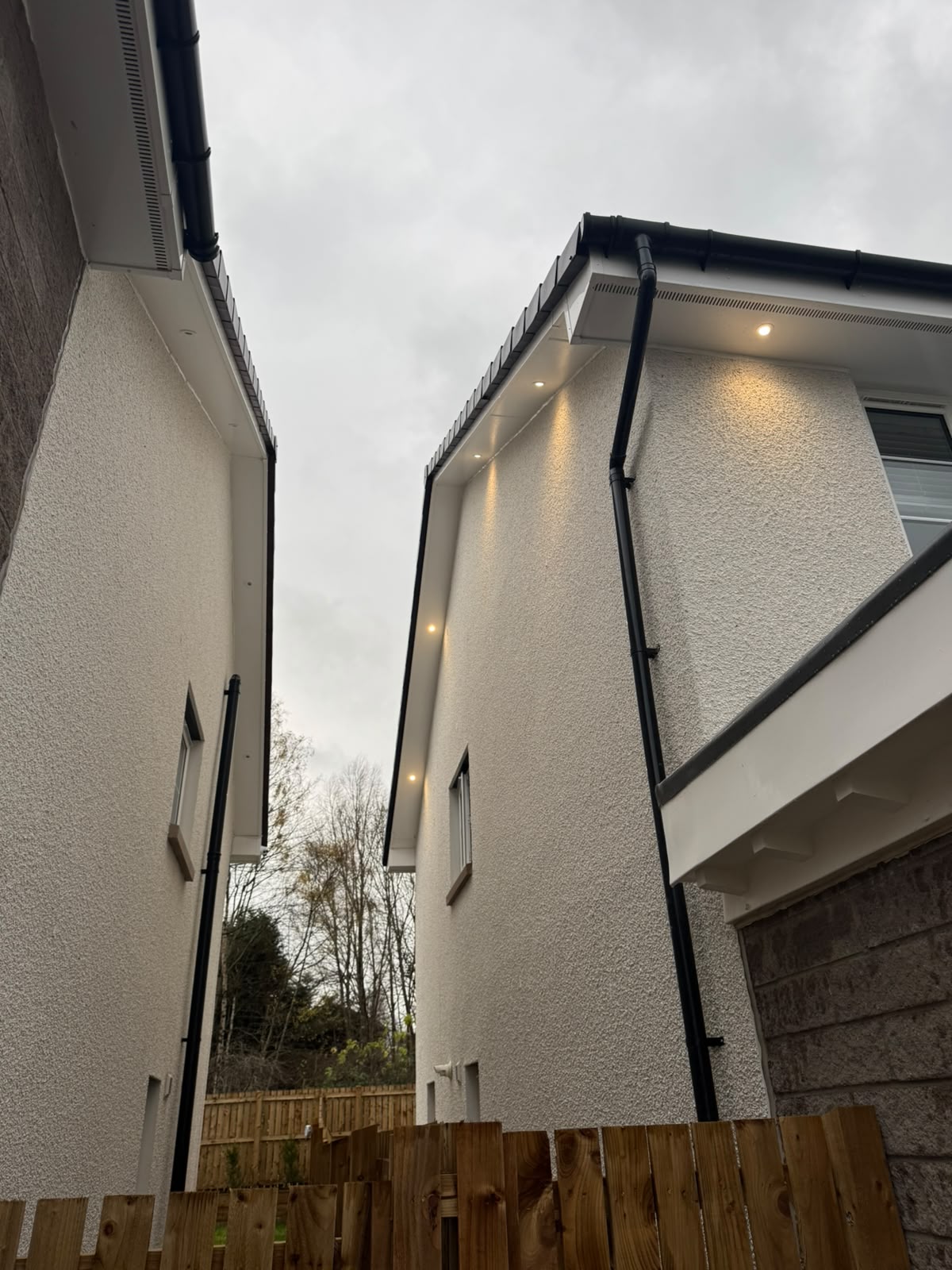 Soffit lighting installation by Electrust — LED downlights under the eaves of a Scottish home